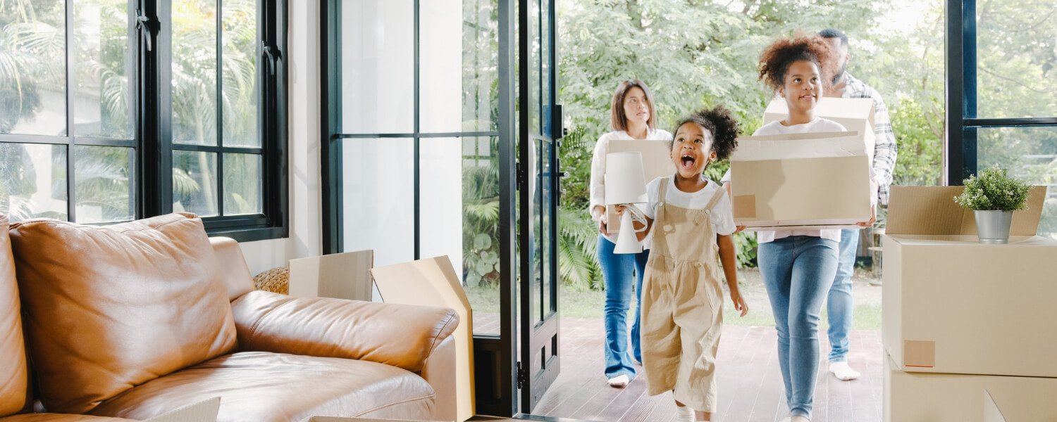happy african american young family bought new house